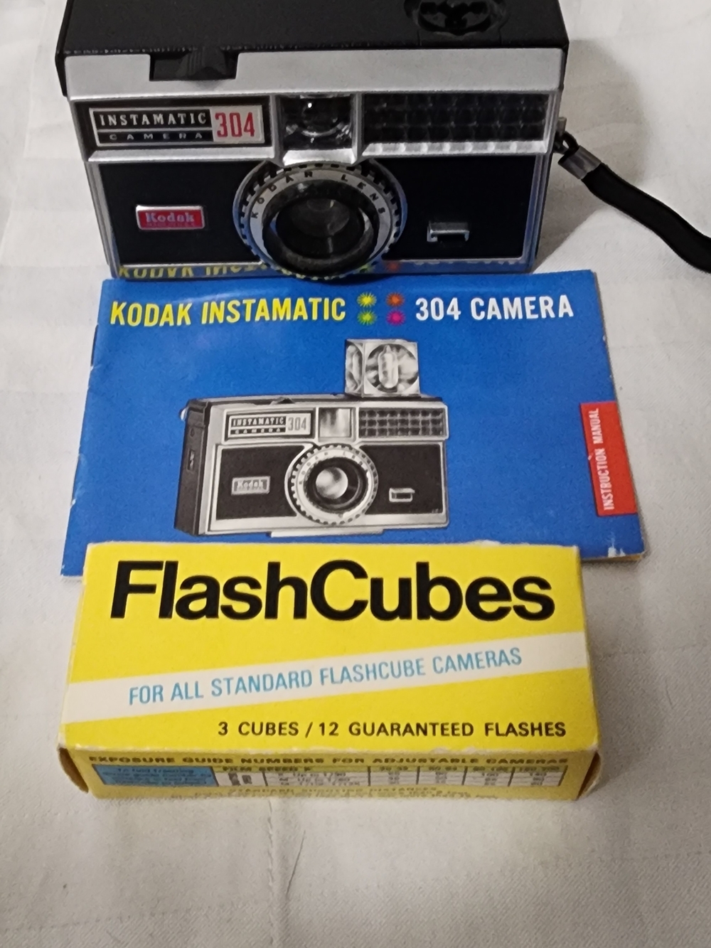 Kodak Instamatic 304 Camera in Black with Yellow FlashCube Box